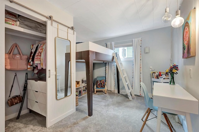carpeted bedroom featuring baseboards
