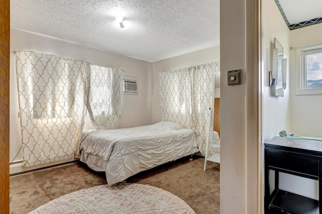 bedroom featuring carpet flooring, an AC wall unit, and a textured ceiling