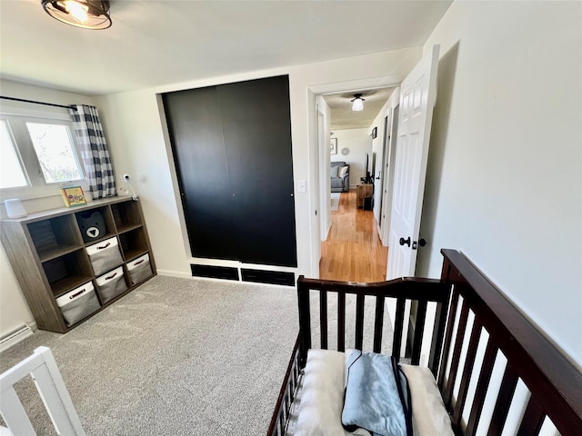 bedroom featuring baseboards and carpet floors