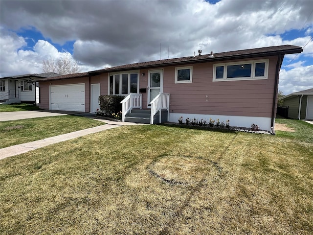 ranch-style home featuring concrete driveway, an attached garage, and a front yard