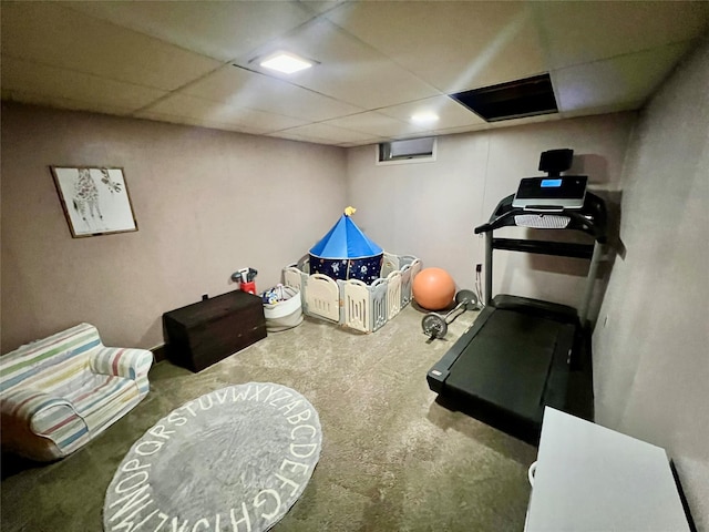exercise room with a drop ceiling