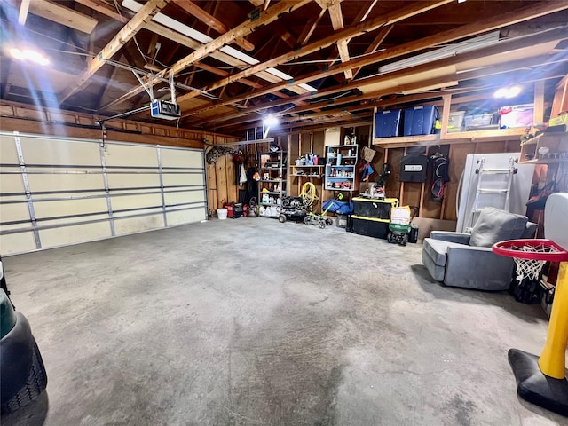garage featuring a garage door opener