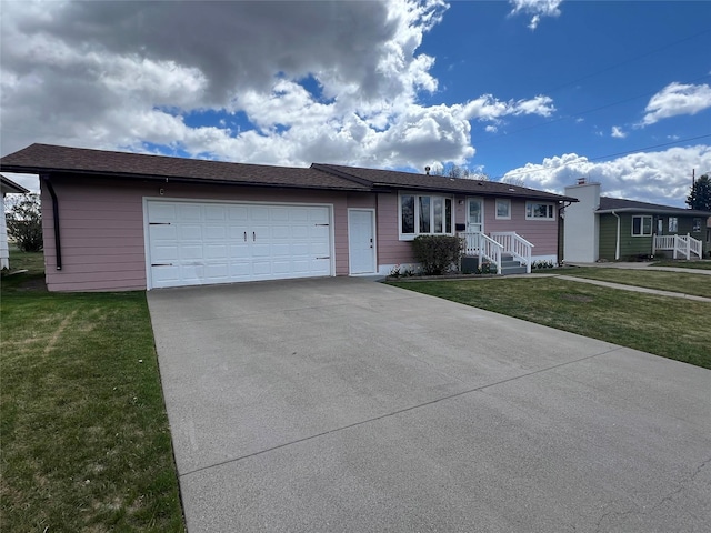 ranch-style house with an attached garage, driveway, and a front yard