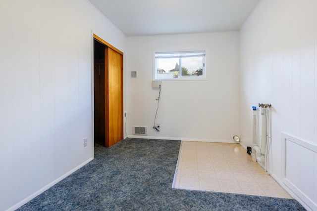 clothes washing area featuring visible vents