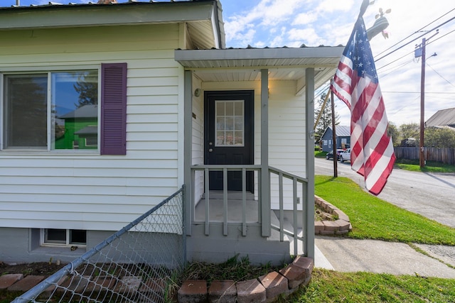 property entrance featuring fence