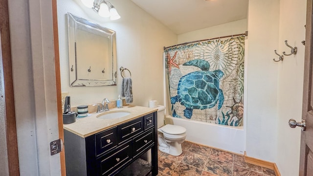 full bath with vanity, shower / bathtub combination with curtain, toilet, and stone finish flooring