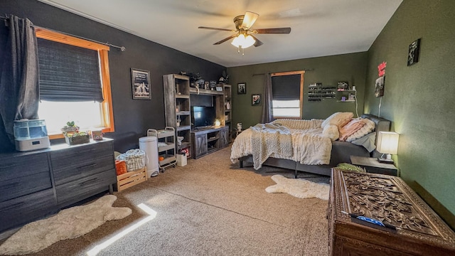 carpeted bedroom with ceiling fan