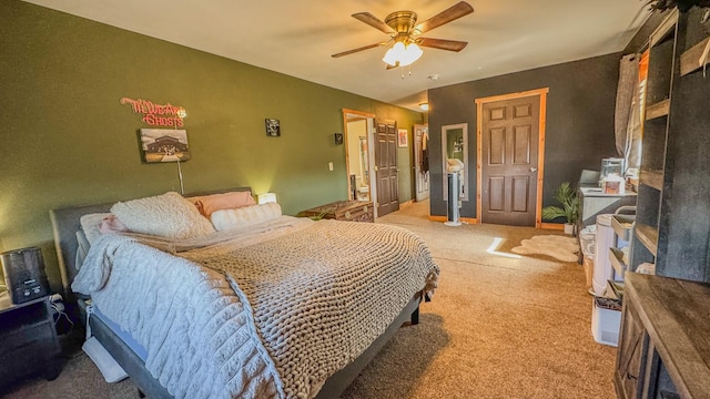 bedroom featuring carpet flooring and a ceiling fan