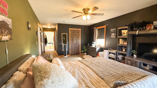 bedroom with carpet floors and a ceiling fan