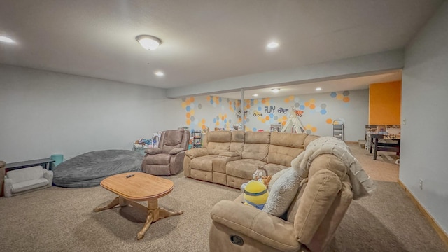carpeted living area featuring recessed lighting and baseboards