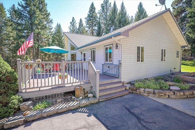 261 Green Briar Trl, Eureka, MT 59917 - single story home featuring a wooden deck