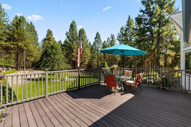 261 Green Briar Trl, Eureka, MT 59917 - deck with a yard and outdoor dining area
