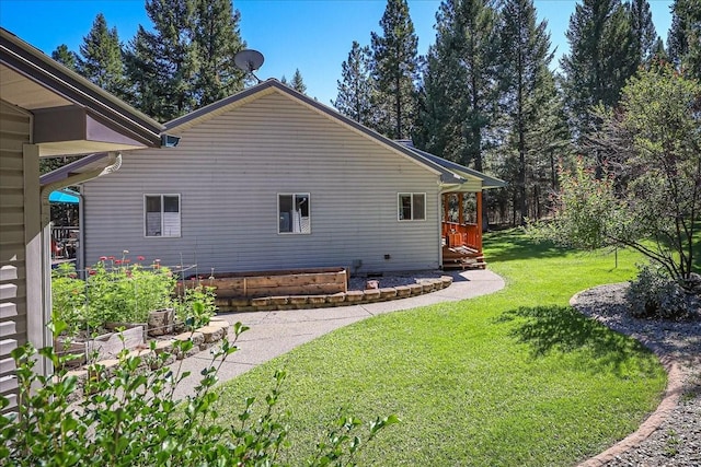 261 Green Briar Trl, Eureka, MT 59917 - view of property exterior with a lawn
