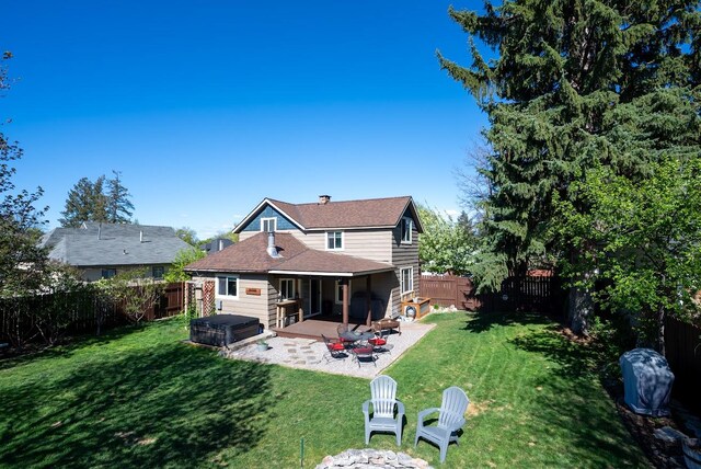 617 N 5th St, Hamilton, MT 59840 - view of front of home featuring a porch, roof with shingles, a front yard, and a chimney