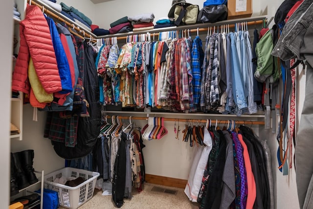 walk in closet with visible vents
