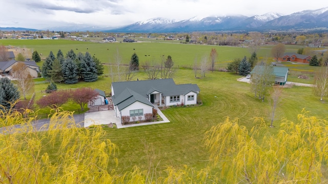 aerial view with a mountain view and a rural view