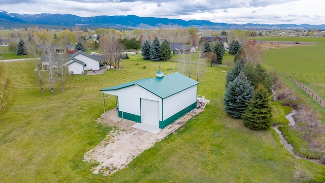 drone / aerial view featuring a mountain view