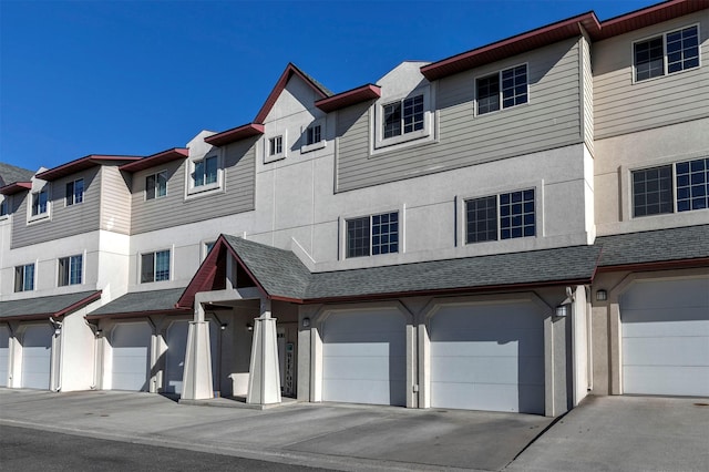 825 Crestmont Way, Missoula, MT 59803 - multi unit property with stucco siding and a garage