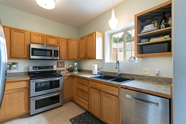 kitchen with open shelves, a sink, stainless steel appliances, decorative light fixtures, and light tile patterned floors