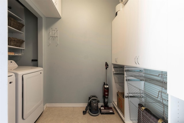 825 Crestmont Way, Missoula, MT 59803 - laundry room featuring cabinet space, washing machine and clothes dryer, and baseboards