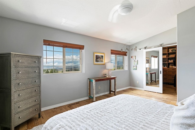 825 Crestmont Way, Missoula, MT 59803 - bedroom featuring wood finished floors and baseboards