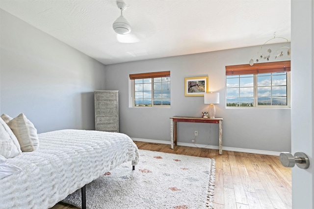 825 Crestmont Way, Missoula, MT 59803 - bedroom with baseboards and wood finished floors