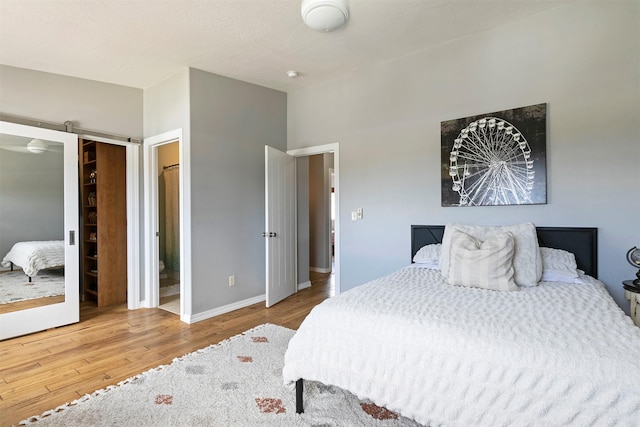 825 Crestmont Way, Missoula, MT 59803 - bedroom with wood finished floors and baseboards