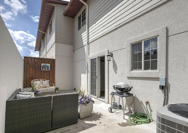 825 Crestmont Way, Missoula, MT 59803 - view of patio with central AC unit, outdoor lounge area, area for grilling, and fence