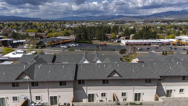 birds eye view of property featuring a mountain view
