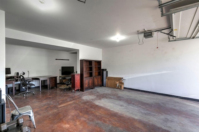 825 Crestmont Way, Missoula, MT 59803 - garage featuring an office area and a garage door opener