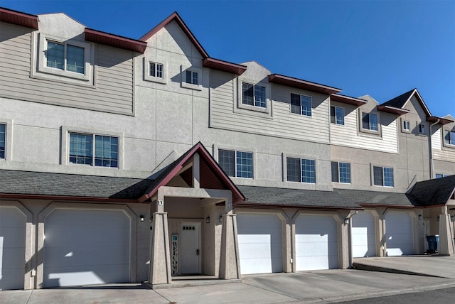 825 Crestmont Way, Missoula, MT 59803 - townhome / multi-family property with an attached garage and stucco siding