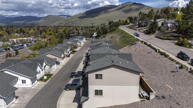 bird's eye view featuring a mountain view and a residential view
