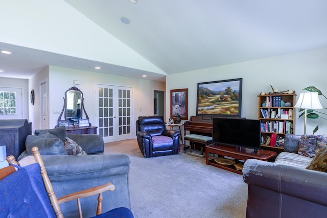 carpeted living room with recessed lighting, french doors, and lofted ceiling