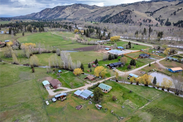 bird's eye view featuring a mountain view and a rural view