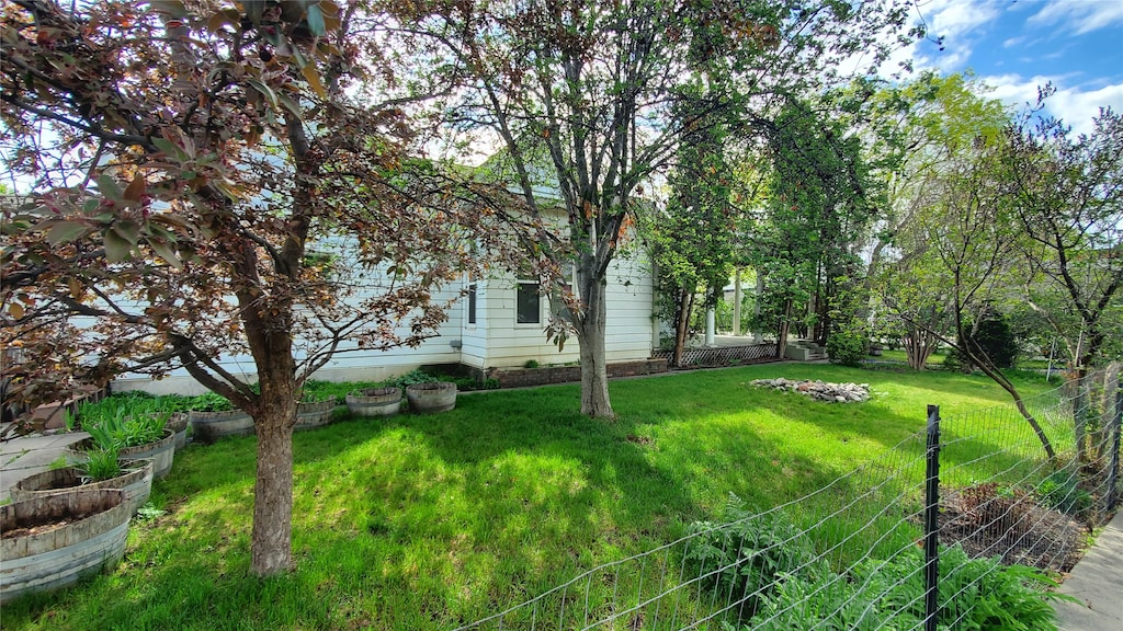 view of yard with fence