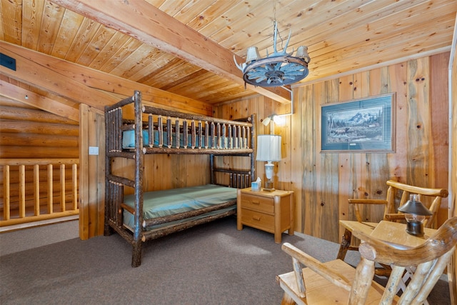 bedroom featuring carpet flooring, wooden walls, rustic walls, and wooden ceiling