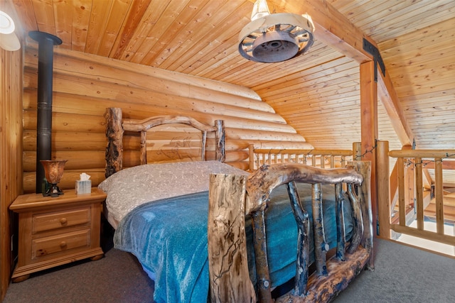 carpeted bedroom with wooden ceiling and log walls
