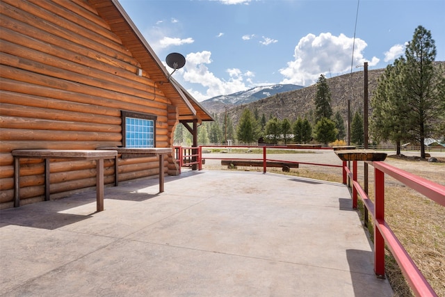 view of patio featuring a mountain view