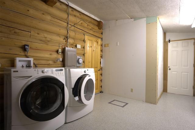 laundry room featuring separate washer and dryer