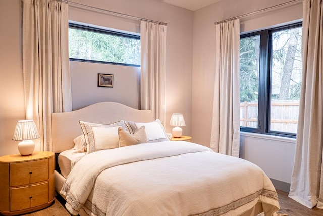 bedroom featuring wood finished floors
