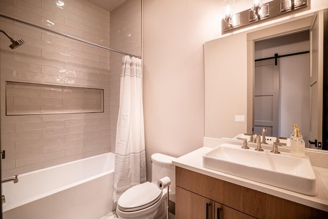 bathroom featuring vanity, shower / bath combo with shower curtain, and toilet
