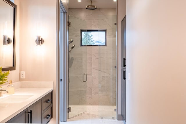 full bath with vanity, recessed lighting, and a stall shower
