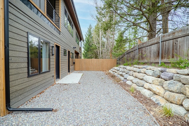 view of yard featuring a fenced backyard and a patio area