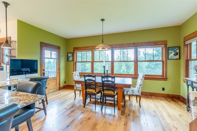 6710 Farm To Market Rd, Whitefish, MT 59937 - dining room featuring plenty of natural light and light wood-style floors
