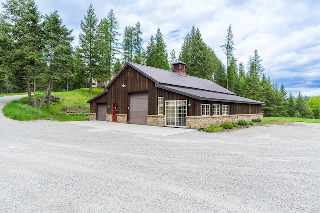 exterior space featuring a detached garage