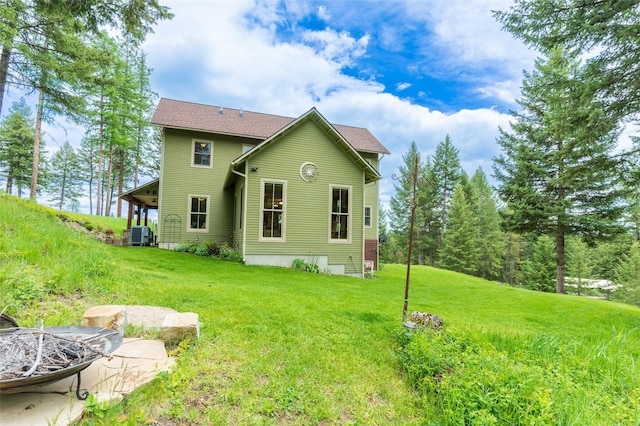 6710 Farm To Market Rd, Whitefish, MT 59937 - back of house with a lawn