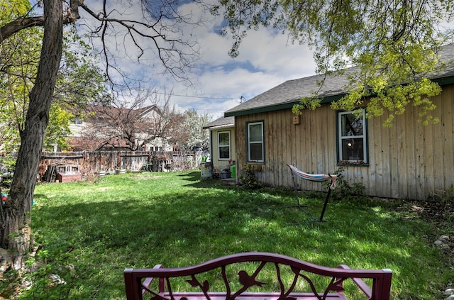 view of yard with fence