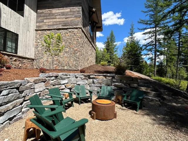 exterior space with stone siding