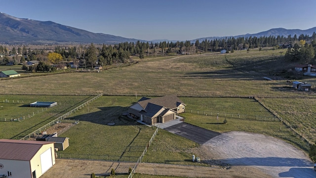 aerial view featuring a mountain view and a rural view