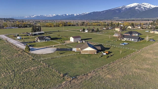 aerial view featuring a rural view and a mountain view